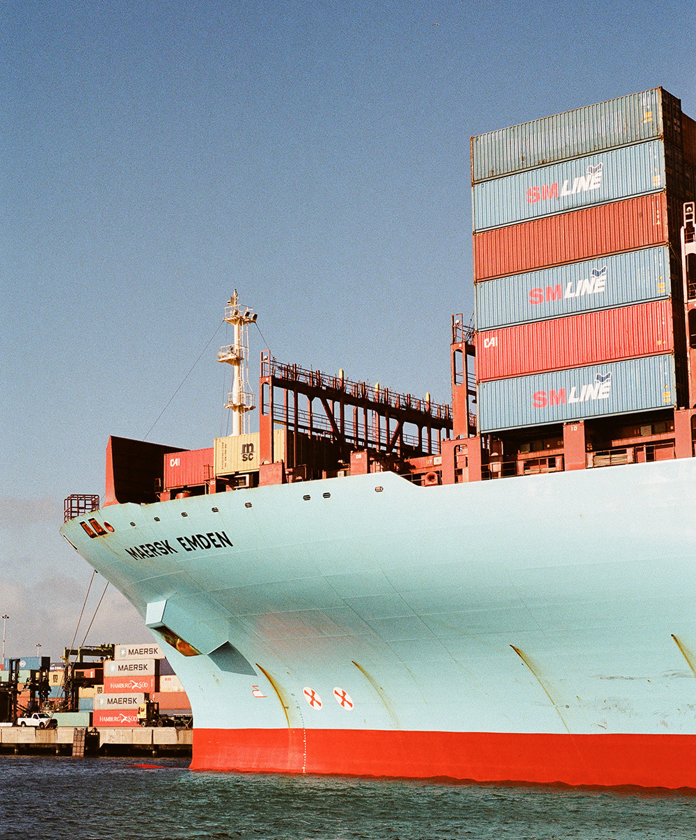 photo of ship with cargo containers