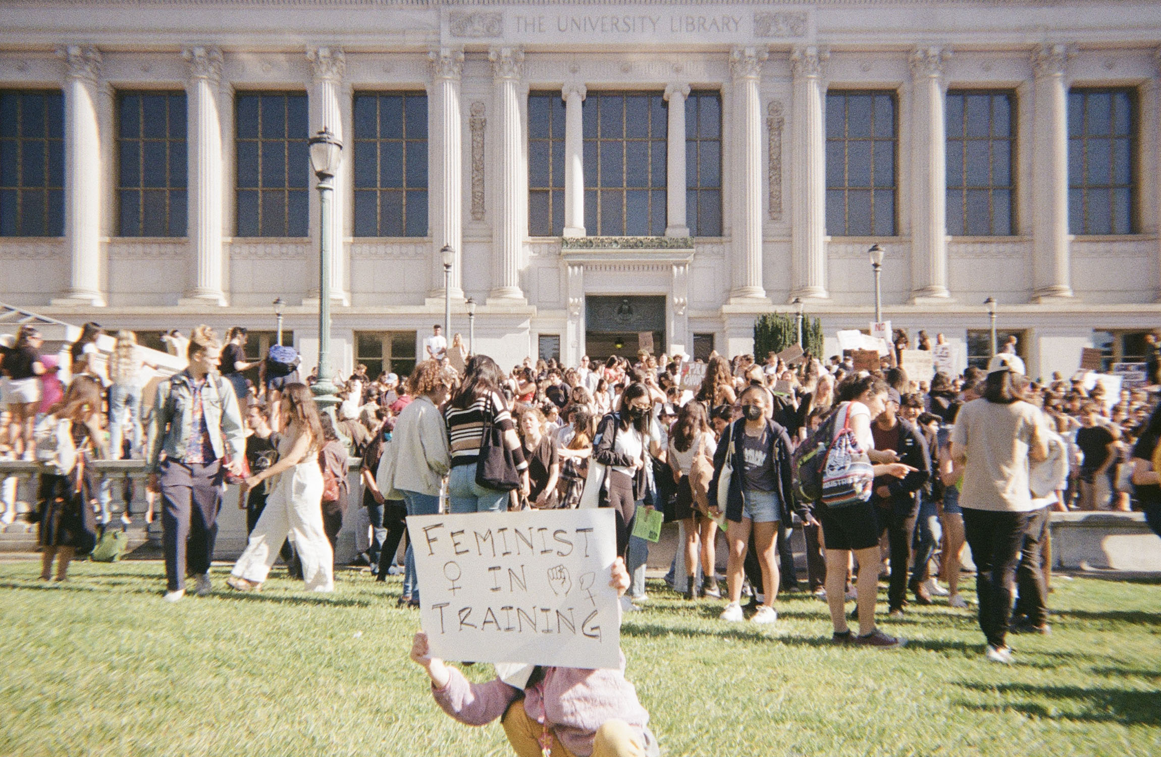 photo of the abortion right's protest with a kid in the front holding a sign